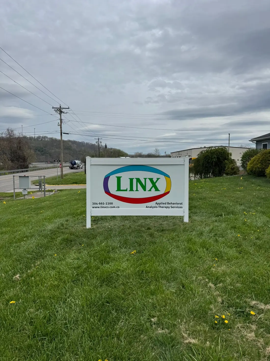 Completed commercial ground sign installed between the support posts