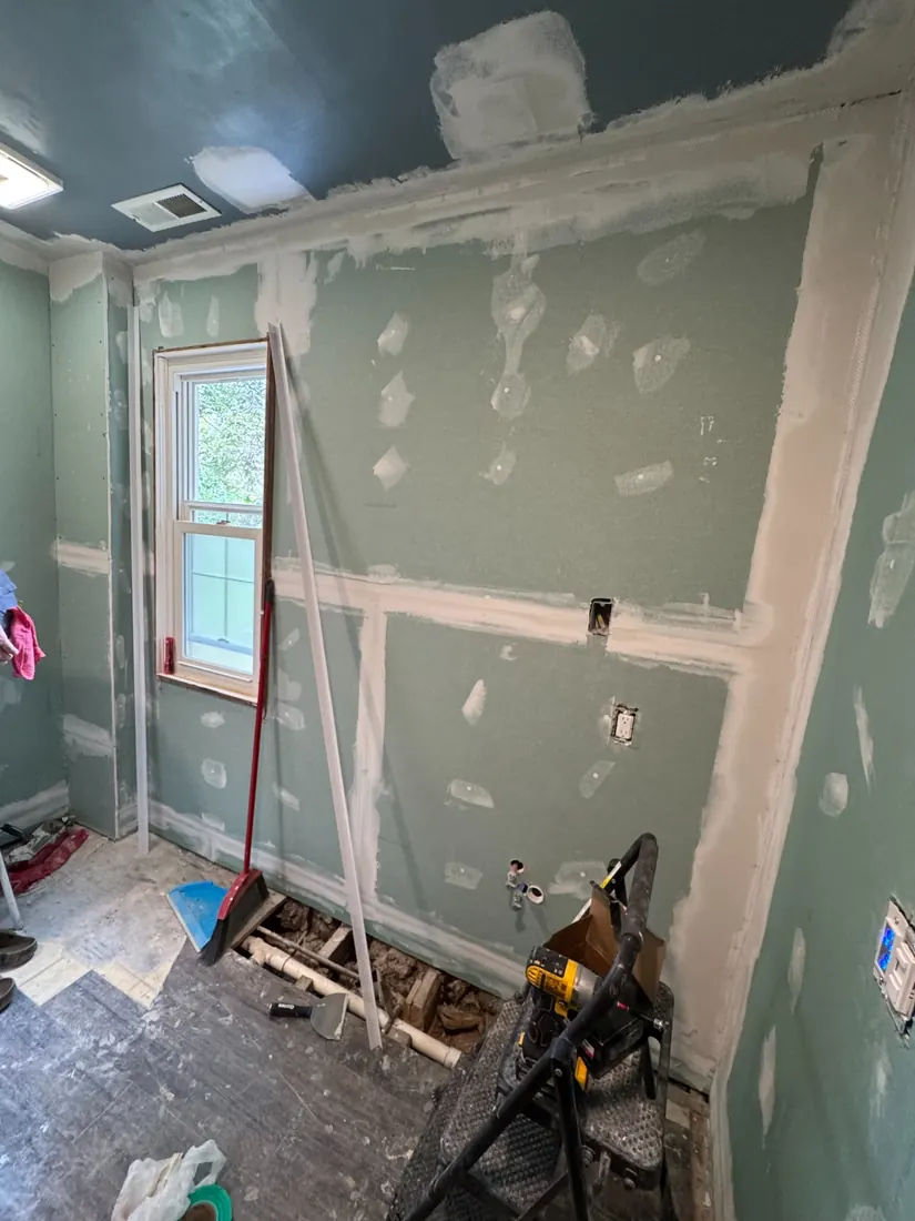 Frontline Bathroom Project 1 during drywall installation and finishing